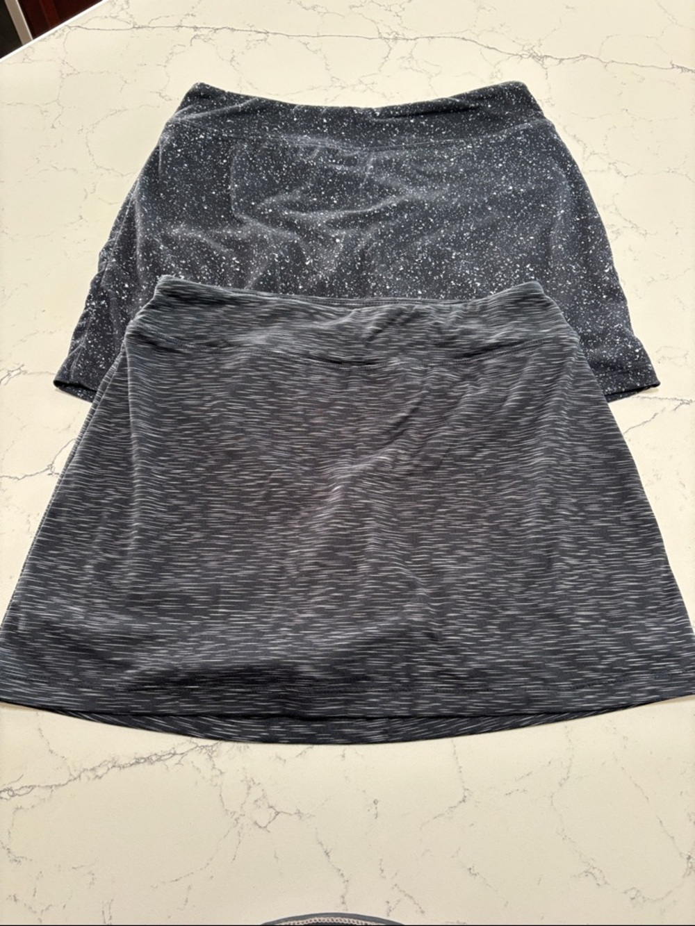 Women' navy and grey patterned Heathered A-Line Skorts.